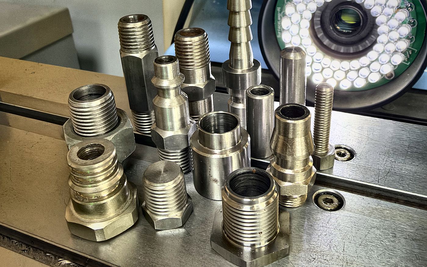 Turned fittings and couplings on a measuring stage